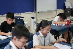 Students revising intensely for PSLE.