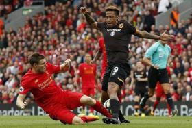 UTILITY PLAYER: Liverpool&#039;s James Milner (left) has shone despite being thrust into the left-back position, where Alberto Moreno had proven to be a disappointment earlier in the season.