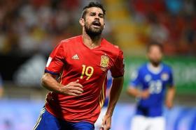 3 Diego Costa (right) has scored three goals in 12 international games for Spain.