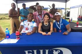 HEROES HAILED: Fiji&#039;s Olympic gold medal rugby sevens captain Osea Kolinisau (left) and star player Samisoni Viriviri (right) flank Miss Fiji, Priyanka Pooja, at a celebration for their Rio triumph. With them is the writer, Godfrey Robert.  
