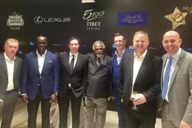 STAR-STUDDED: The New Paper&#039;s consulting editor Godfrey Robert (centre) with (from far left) Paul Scholes, Dwight Yorke, Robbie Fowler, Lee Sharpe, David May and Gary McAllister in China.  
