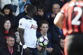HARD MAN: Bournemouth&#039;s Harry Arter lying on the ground after clashing with Tottenham&#039;s Moussa Sissoko (left).