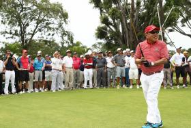 1ST TEE:  Low Teo Ping (above), president of Sentosa Golf Club, at the inaugural tee-off of the New Tanjong yesterday.