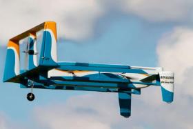Amazon said it completed its first delivery by drone earlier this month, in what the global online giant hopes will be a trend in automated shipments by air.