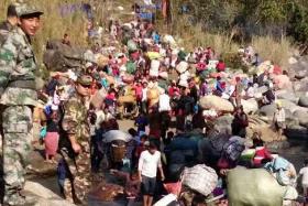 Thousands flee Myanmar violence
