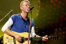 Chris Martin of Coldplay performing at the Rose Bowl in Pasadena in Aug, 2016