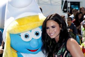 Demi Lovato returns to her roots in new Smurfs film