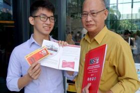 Mr Melvin Tan De Zheng and his father Dave Tan Jong were among the 500 national servicemen who received their NS50 packages at ceremonies on 9 April 2017.