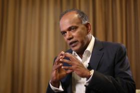 Home Affairs and Law Minister K. Shanmugam urged Singaporeans to tell the authorities if a family member or friend is being led astray by extremist ideology