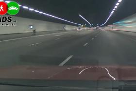 In-car camera footage from a taxi showed an e-scooter user riding on the KPE on the morning of June 16.