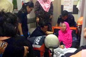 The scene at Block 542 Jurong West Avenue 1 on Saturday night, when a lift dropped four floors, injuring a woman in her 30s