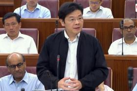 Lawrence Wong speaking in Parliament on July 3, 2017.