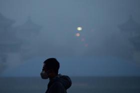 China vows to cut air pollution by at least 15%