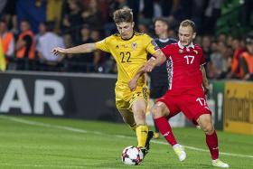 Woodburn shines for Wales again