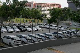 Private hire cars at Singapore General Hospital carpark H.