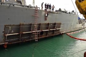 US destroyer on its way to Japan for repairs
