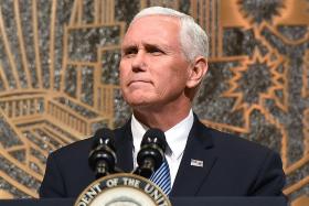 Pence stresses unity at shooting commemoration