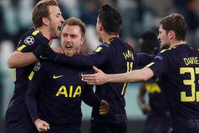 Christian Eriksen (second from left) celebrating with his teammates after scoring the equaliser through a free-kick.