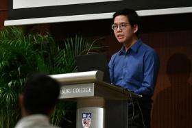 Mr Tan Yang Long giving his speech at the Tembusu Forum on Tuesday. 
