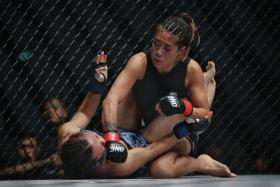 ONE Championship women&#039;s atomweight champion Angela Lee (top) retained her title after defeating Mei Yamaguchi.