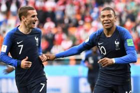 Kylian Mbappe (right) celebrating with Antoine Griezmann after scoring in the 1-0 win over Peru.