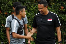 Fandi Ahmad (right, with Zulfadhmi Suzliman) says tonight&#039;s result is important, but he also wants to build the team.  
