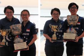 Singapore Bowling Federation vice-president Dr Valerie Teo presenting the trophies to Charlene Lim and Jomond Chia separately.  