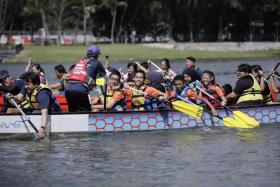 Persons of all abilities trying out dragon-boating at the Let&#039;s Play! at PAssion WaVe @ Marina Bay event on Saturday.