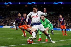 Son Heung Min (in white) on his way to scoring the late winner for Tottenham Hotspur.