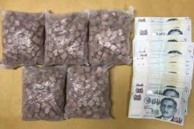 Heroin and cash seized from a suspect arrested in Yishun Avenue 4 during a CNB operation on April 14, 2020.