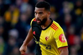 Watford defender Adrian Mariappa is one of three players and staff to have tested positive for the coronavirus.