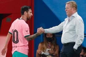 Barcelona coach Ronald Koeman (right) and his captain Lionel Messi have had a positive start to their La Liga campaign, following a 4-0 drubbing of Villarreal on Sunday. 