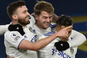 Goals from Stuart Dallas (left) and Patrick Bamford (centre) help Leeds United defeat Newcastle United 5-2 and register their first home win in the English Premier League for three months.