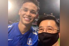 Irfan Fandi (left) with fellow Singaporean Benjamin Tan, the Thai League&#039;s deputy chief executive and director of club licensing.