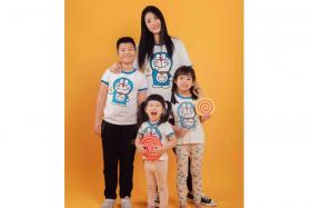 Madam May Chen, the founder of sghotmoms, with her three children. She welcomes the move by tuition centres to prevent virus spread among children. 