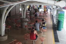 TraceTogether check-in a must at all wet markets, hawker centres