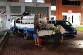 PUB sent water wagons to provide temporary water supplies to residents after discoloured water came out of their taps.