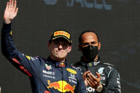 Max Verstappen after winning the Mexico City GP ahead of Lewis Hamilton. 
