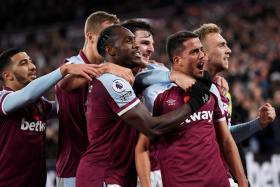 Pablo Fornals (second from far right) celebrates his goal against Liverpool with Michail Antonio (second from far left) and his other West Ham United teammates. 
