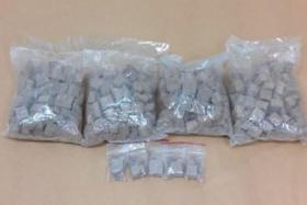 A portion of heroin seized from a 37-year-old Singaporean man during a CNB operation on Dec 15, 2021.
