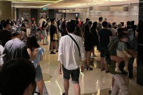 The queue at the lobby of Grand Park Orchard in December last year, when a surge in bookings caused long delays for guests checking-in. 