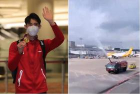 Loh Kean Yew enjoyed a water salute when his flight arrived at Changi Airport. 