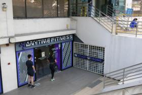 A patron entering the Anytime Fitness gym in Bukit Timah on Dec 21, 2021.