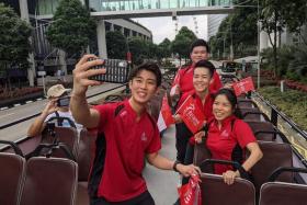 (From left) Loh Kean Yew, Aloysius Yapp, Shayna Ng and Yip Pin Xiu aboard the open-top bus.