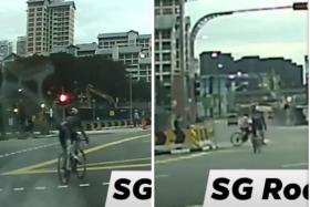 Cyclist beats red light, crashes into another cyclist crossing the street