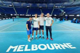Novak Djokovic (second from left) posted a picture with his team from Melbourne Park after being released from Australian immigration detention.