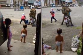 Kids try to stop soldier leaving for duty