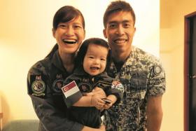 Major Leon Wai, Major Charisia Ong and their 15-month-old daughter, Hannah.