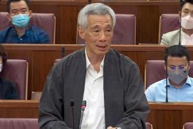 PM Lee Hsien Loong speaking in Parliament during the debate on the Committee of Privileges report on Feb 15, 2022. 
