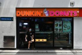 A Dunkin&#039; Donuts store at Tampines MRT station pictured on May 12, 2020. 
